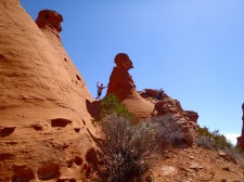 Our 9-year-old and 11-year-old sons climb on the rocks.